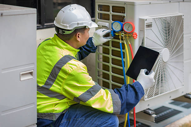 Professional Heat Pump Repair technician working in Peterson, AL